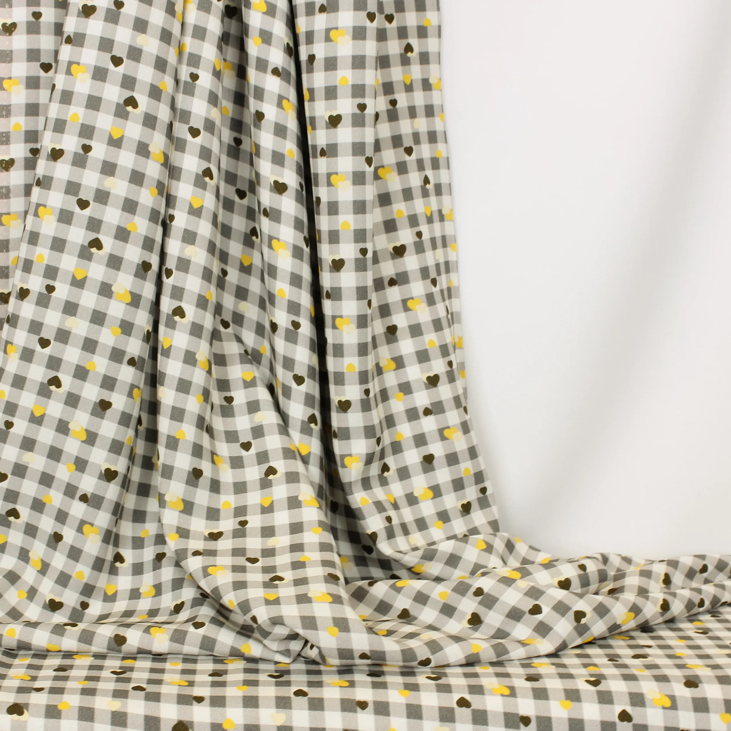 Geruite viscose met bruine en gele hartjes