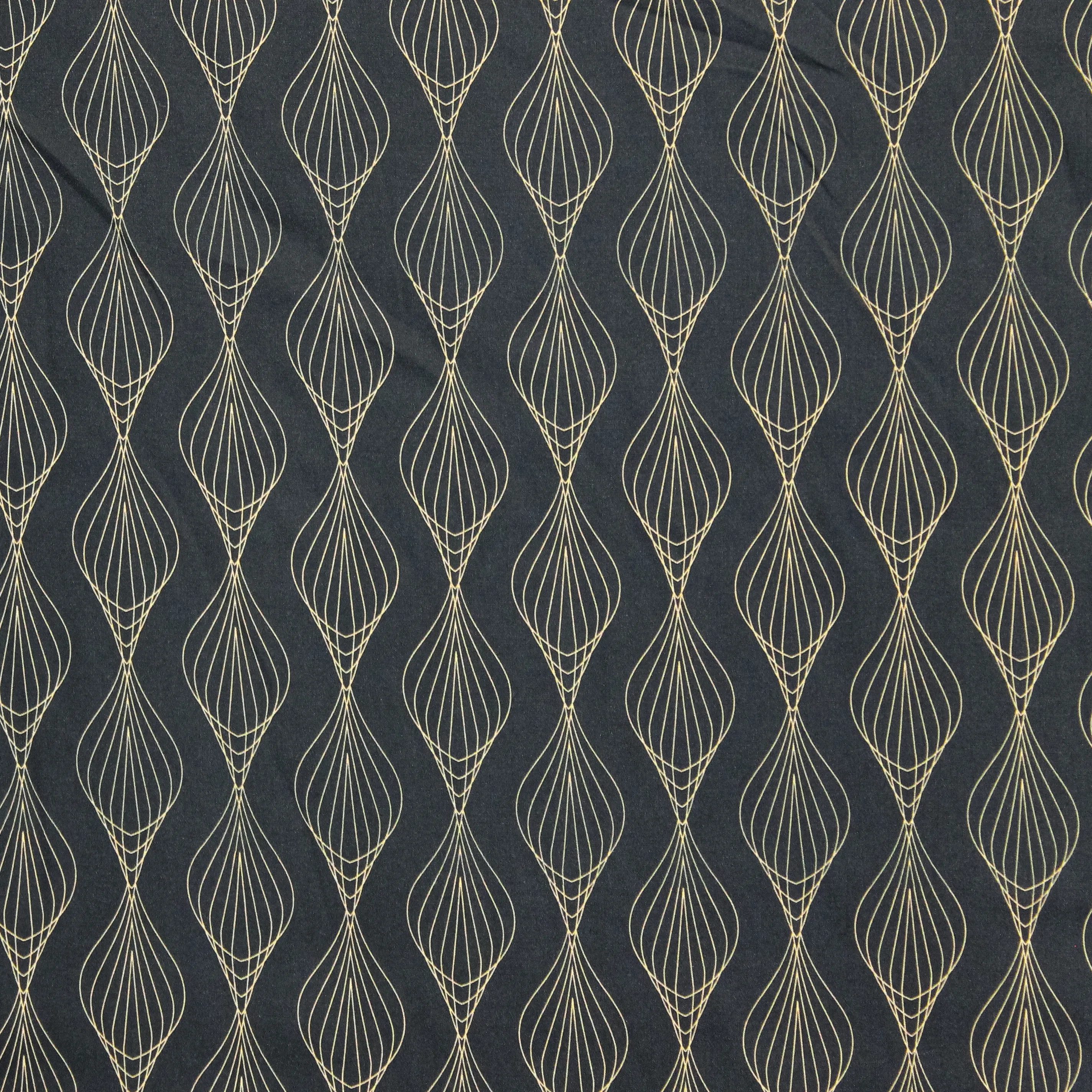 Polyester blauw met geometrisch motief - Knipmode