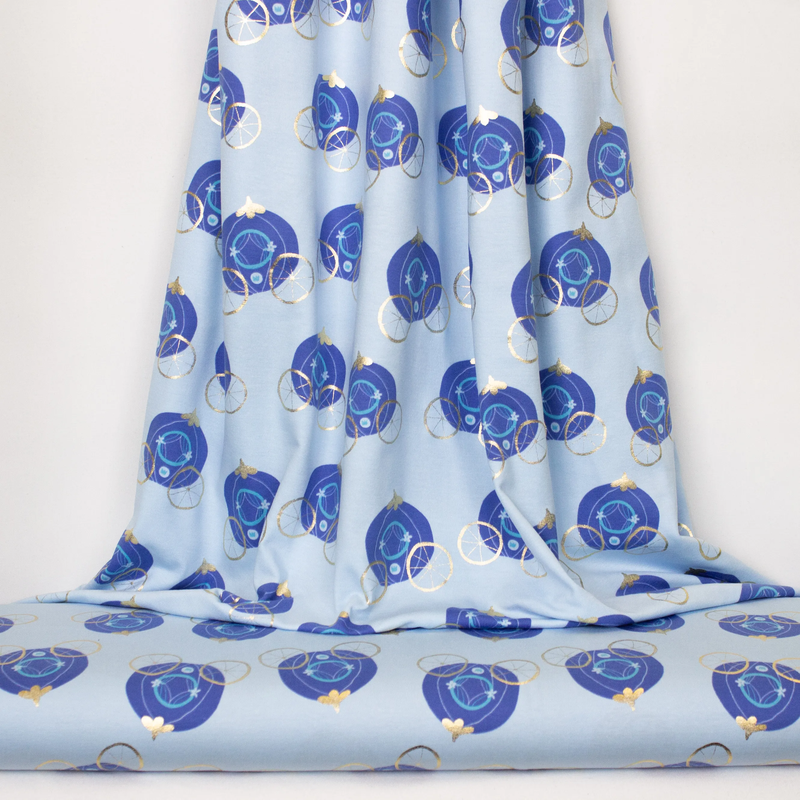 Blauwe tricot met pompoenkoetsen in blauw en goud
