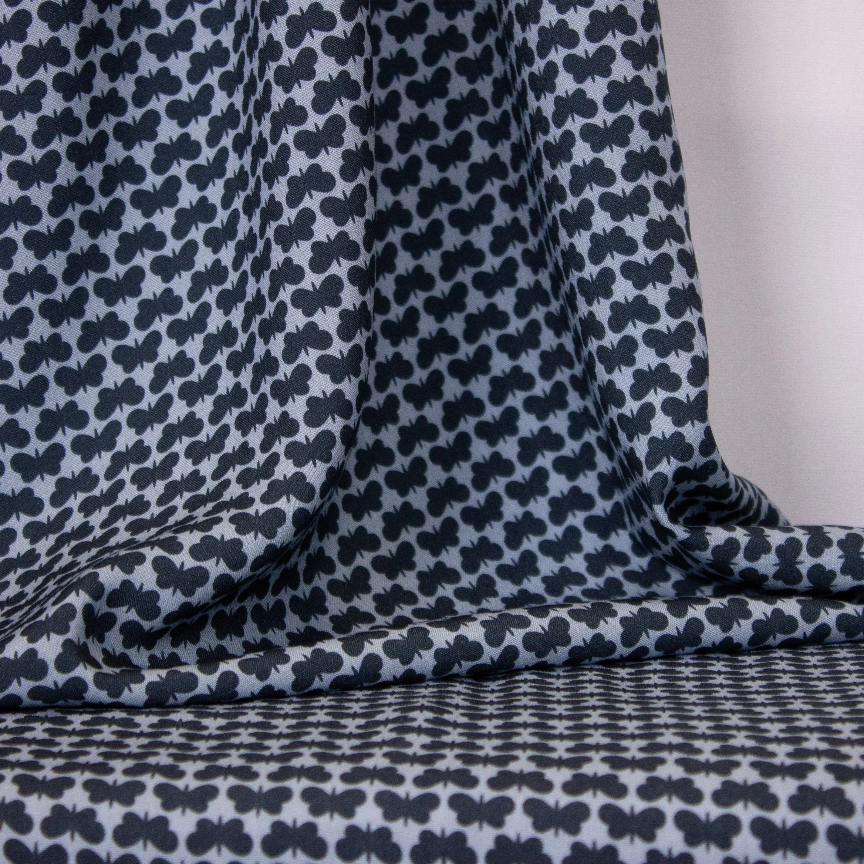 Viscose blauw met vlinders