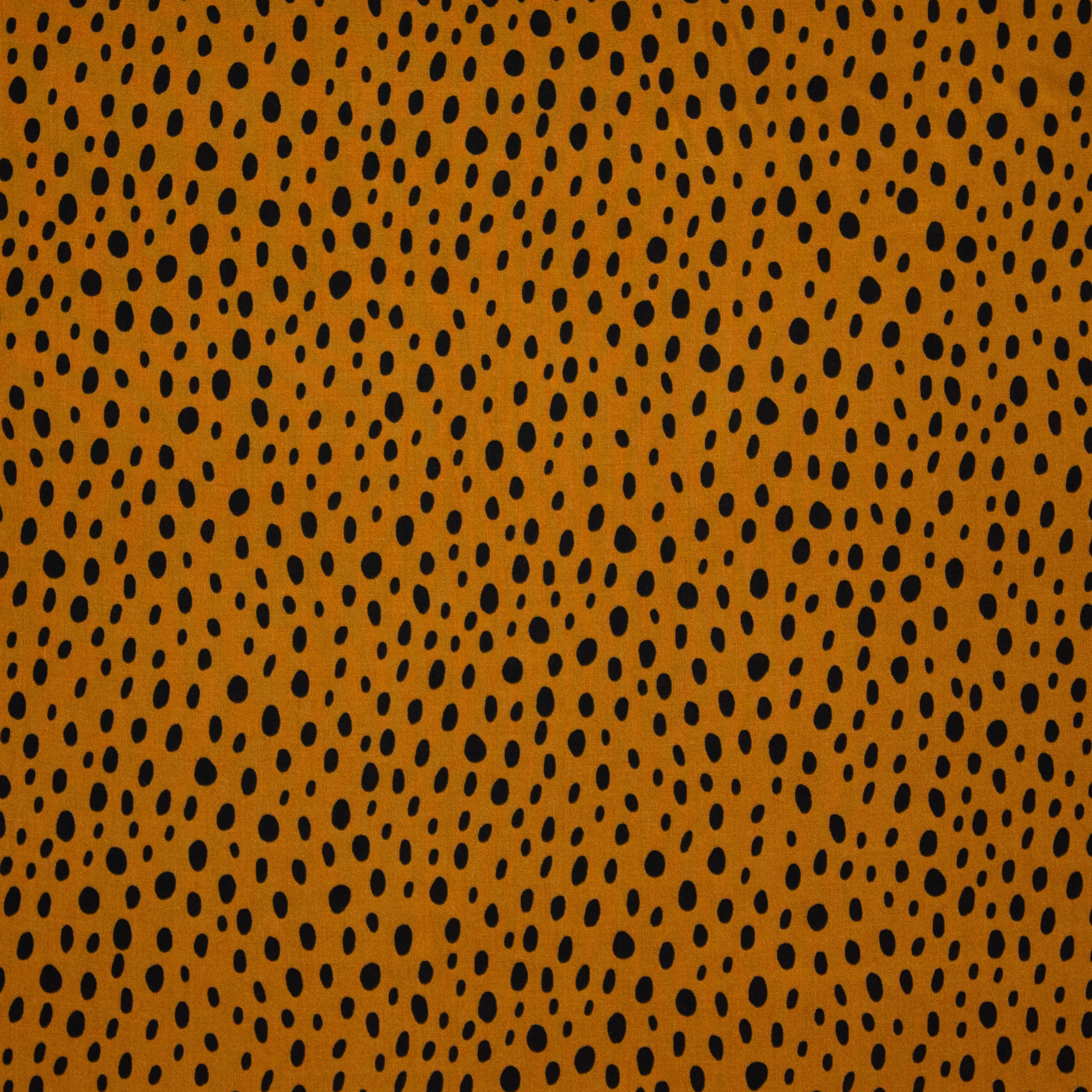 Bruine viscose met donkere stippen