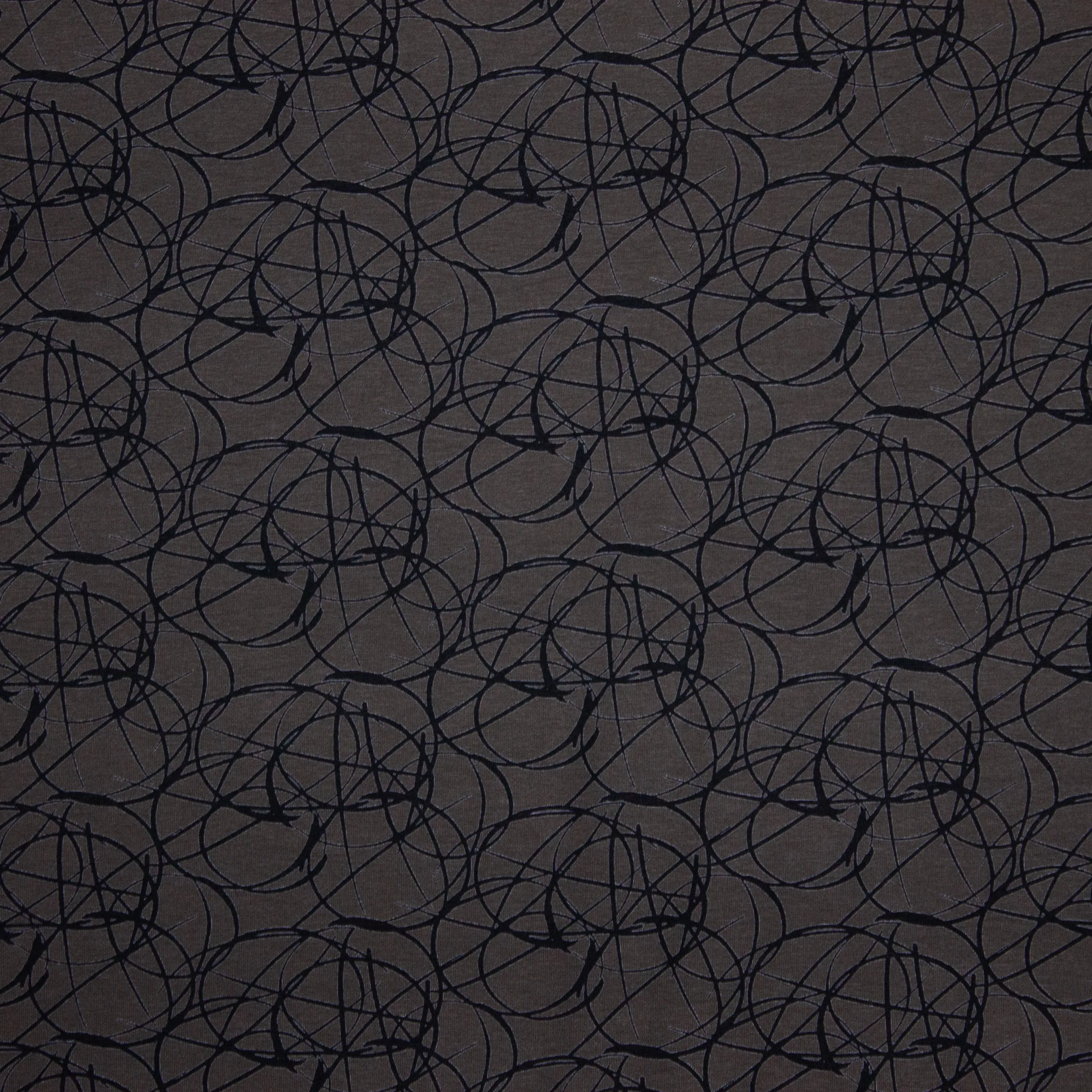 Donkere viscose tricot met abstract zwart motief