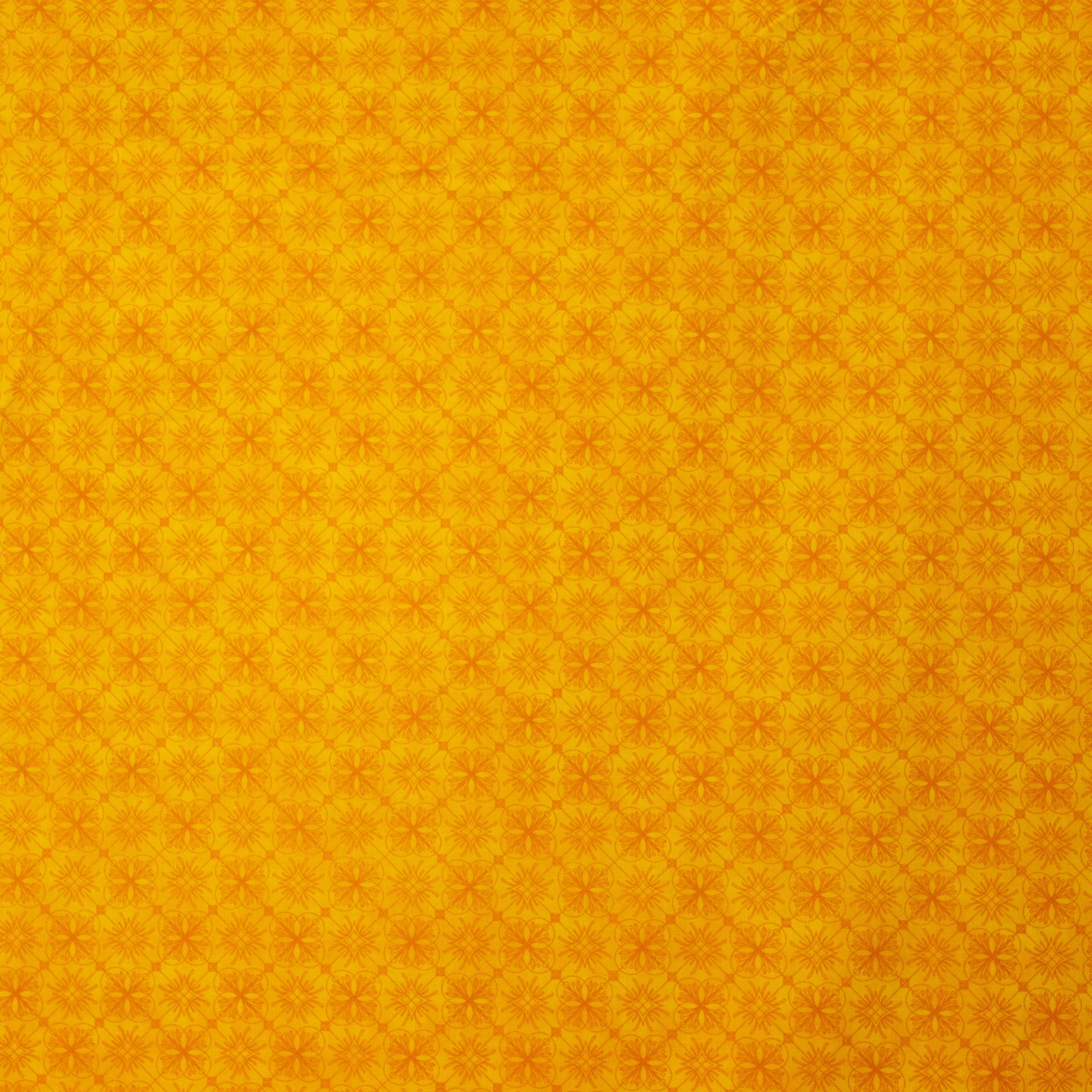 Gele Katoen met Oranje Motief