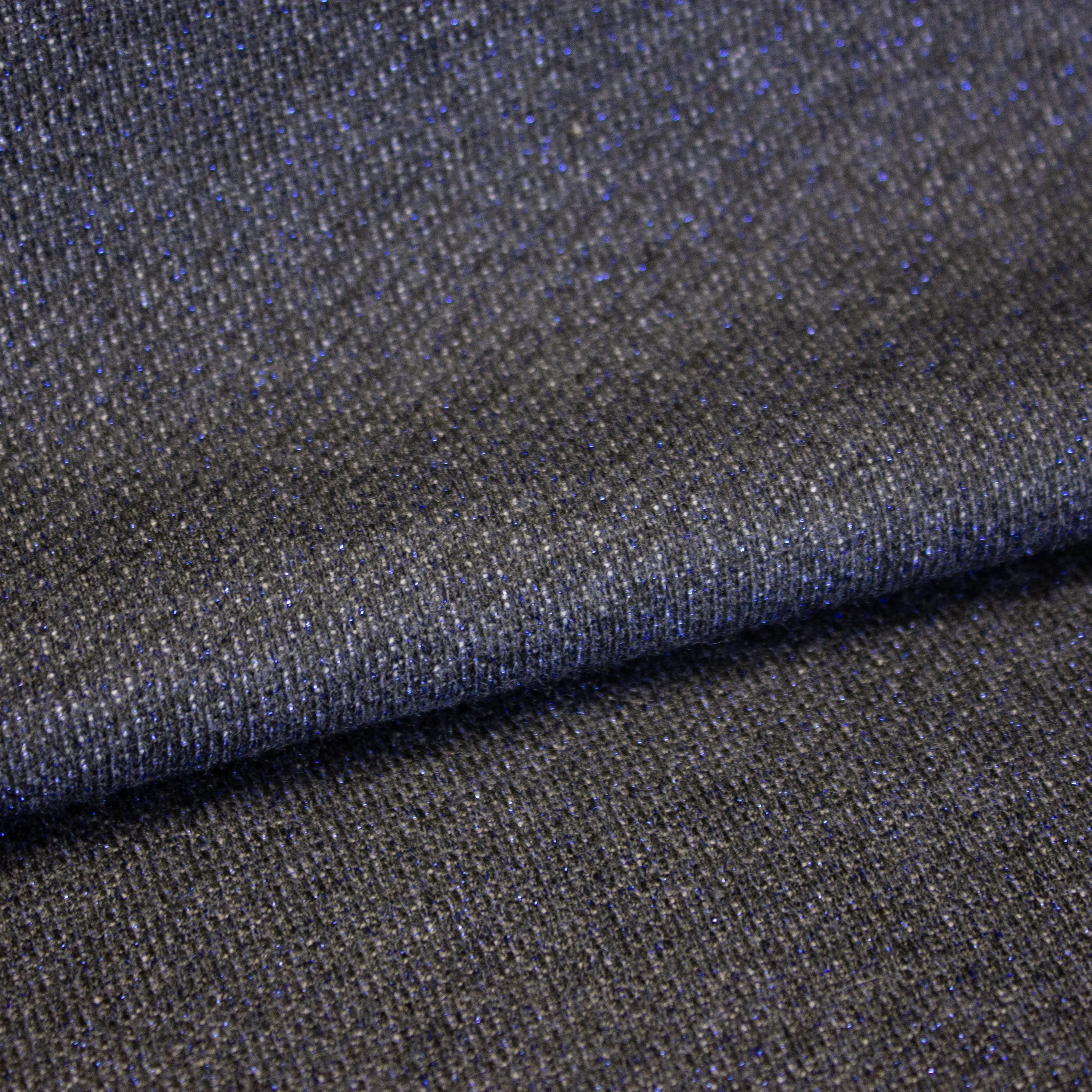 Blauwe sweaterstof in katoen / viscose mengeling met blauwe glitter