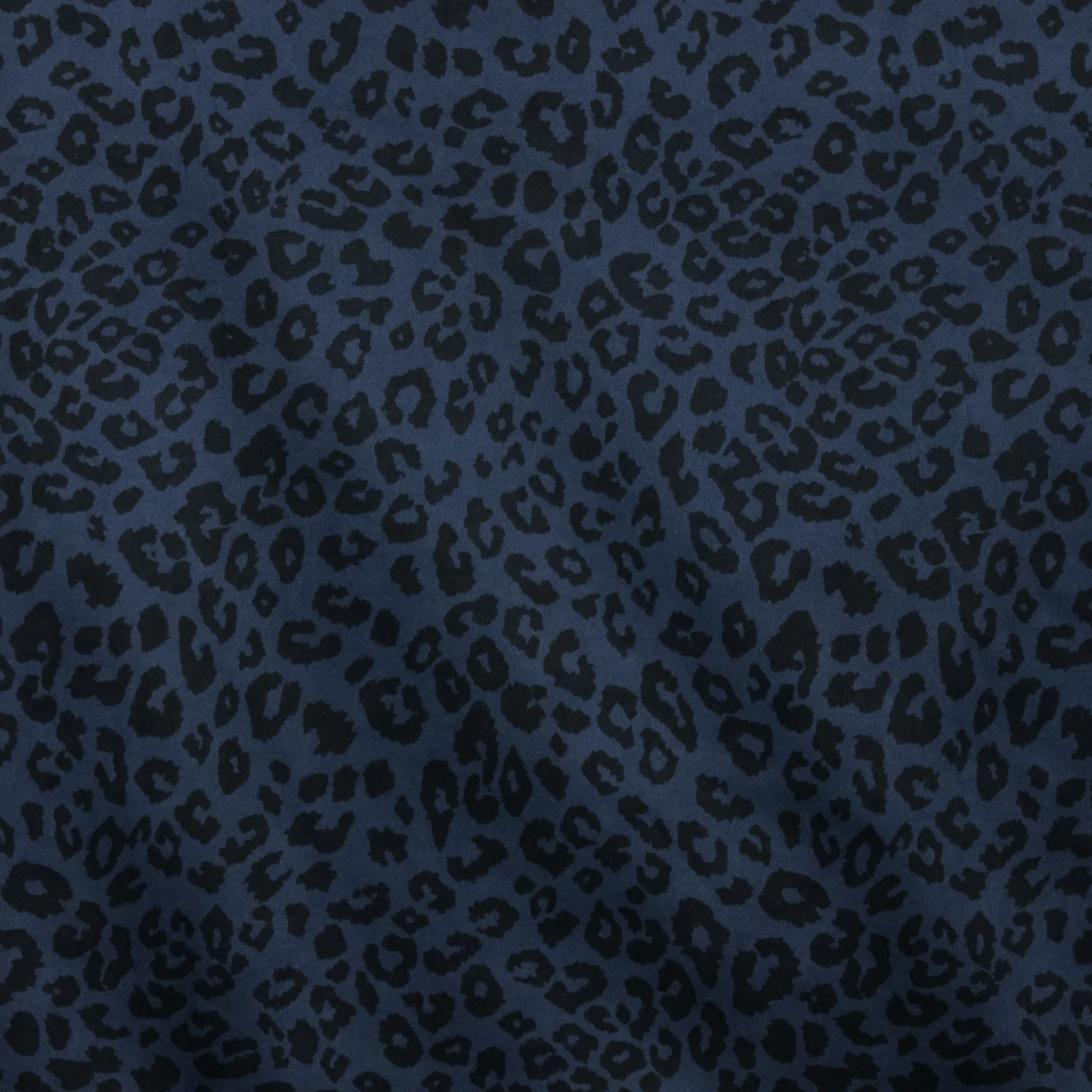 Stretch imitatiedaim blauw met luipaardpatroon
