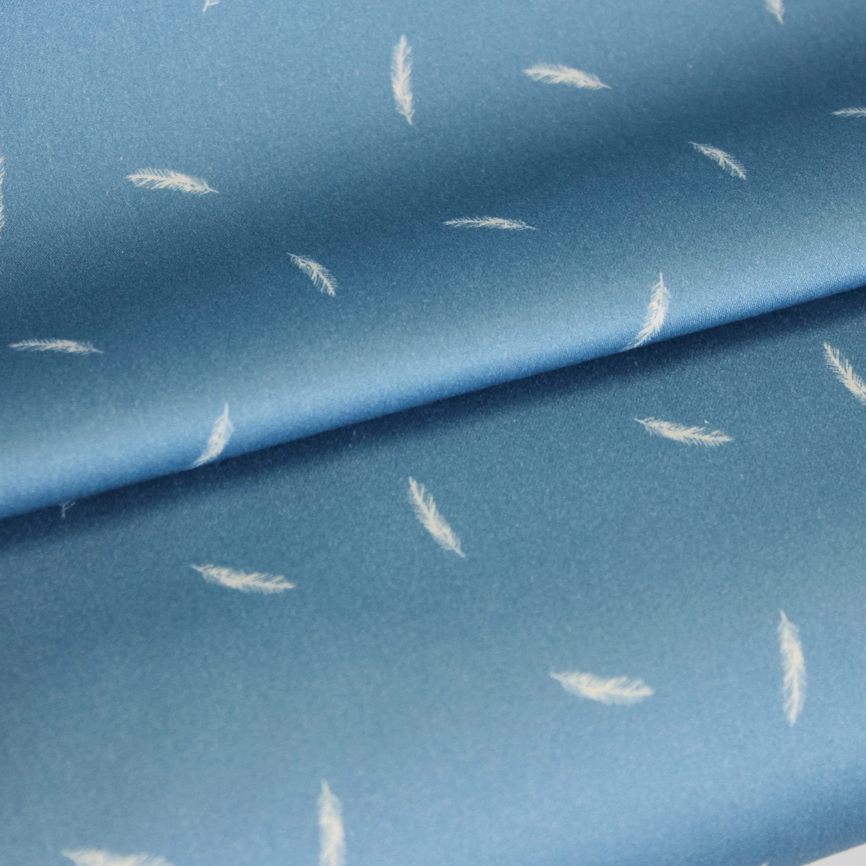 Blauwe katoen stretch met veren - La Maison Victor