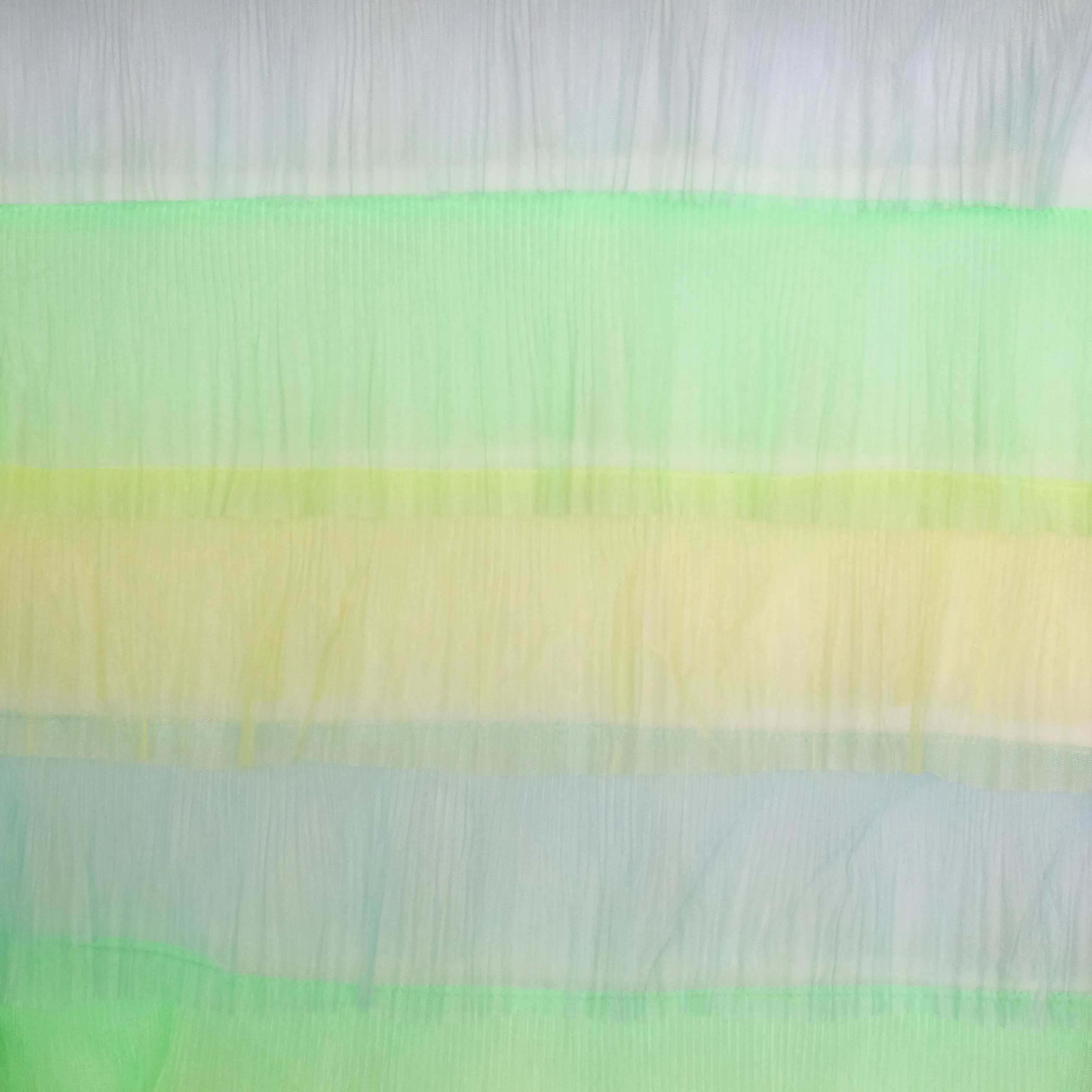 Kleurrijke tule met verschillende laagjes geel-groen-blauw