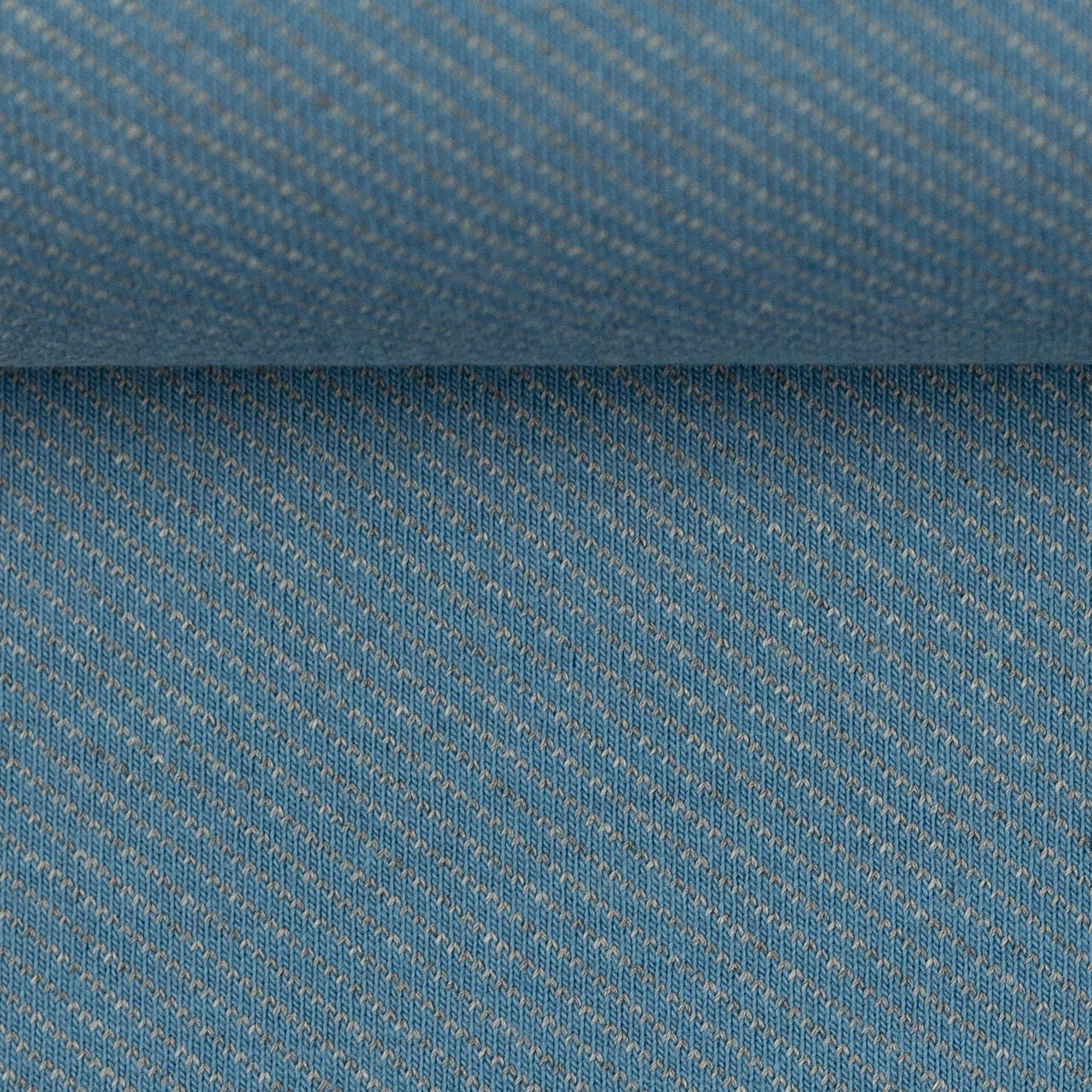 Licht rekbare blauwe jacquard in katoen / polyester