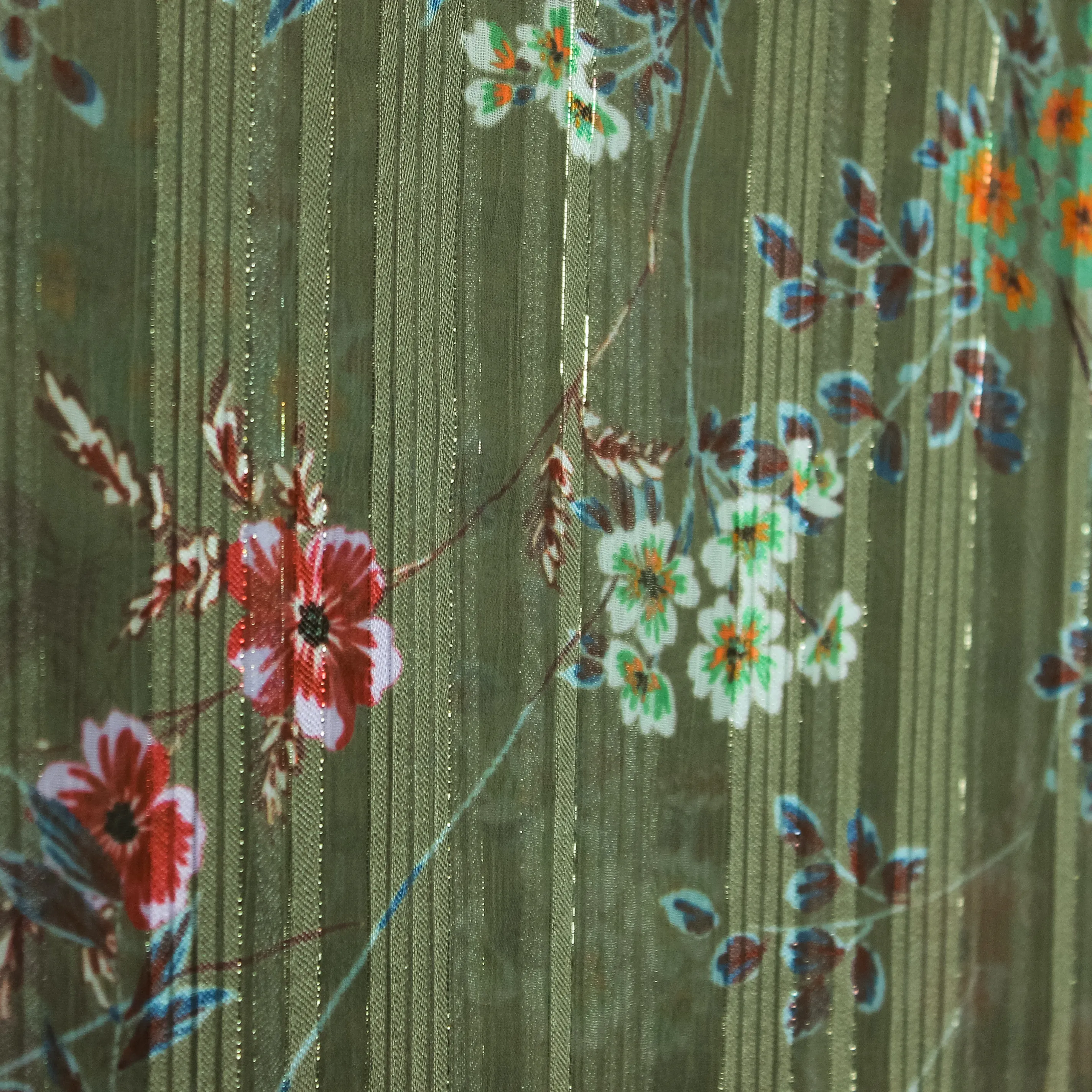 Lichte polyester groen met bloemen - glinsterend