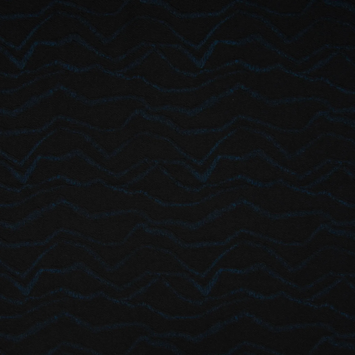 Zwarte stretch jacquard majorca met petrol golvende lijnen