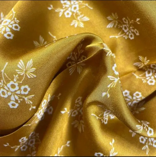 Viscose oker/goud met witte bloemetjes - La Maison Victor