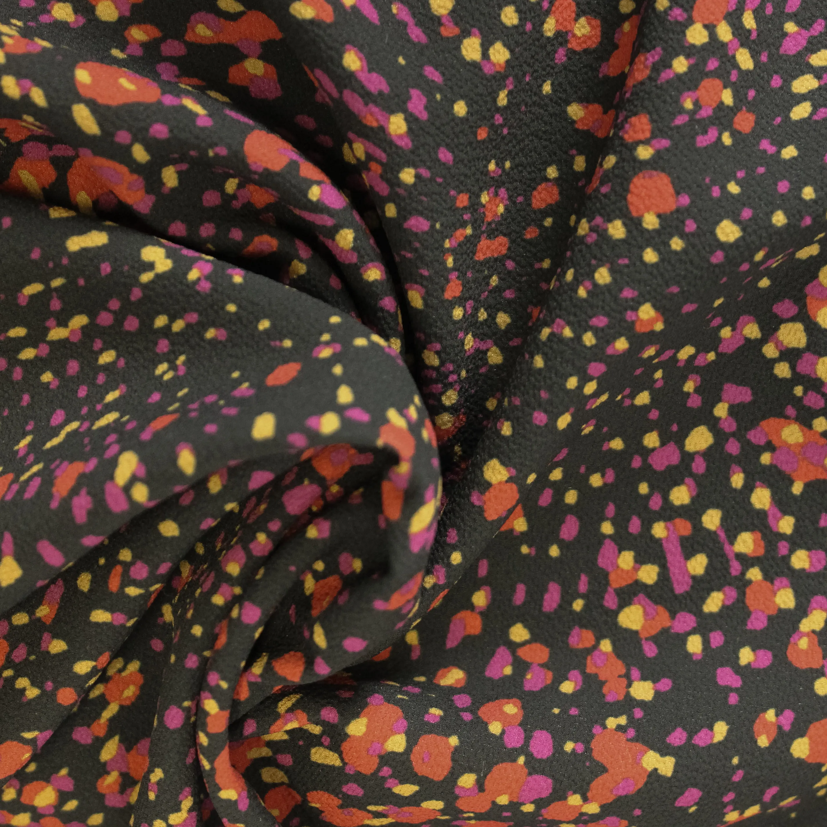 Polyester crêpe zwart met vlekjes - La Maison Victor