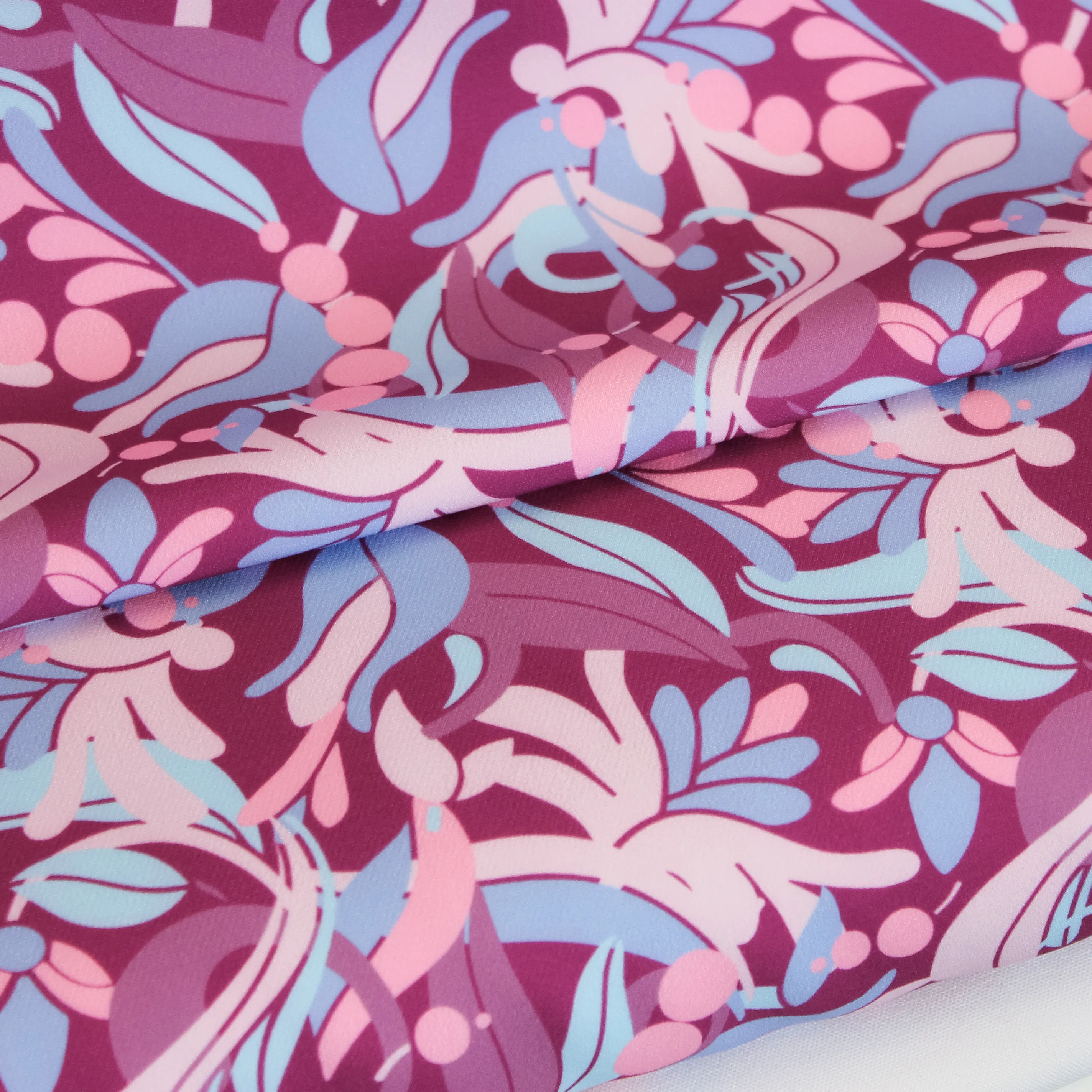 Polyester stretch met roze bloemen
