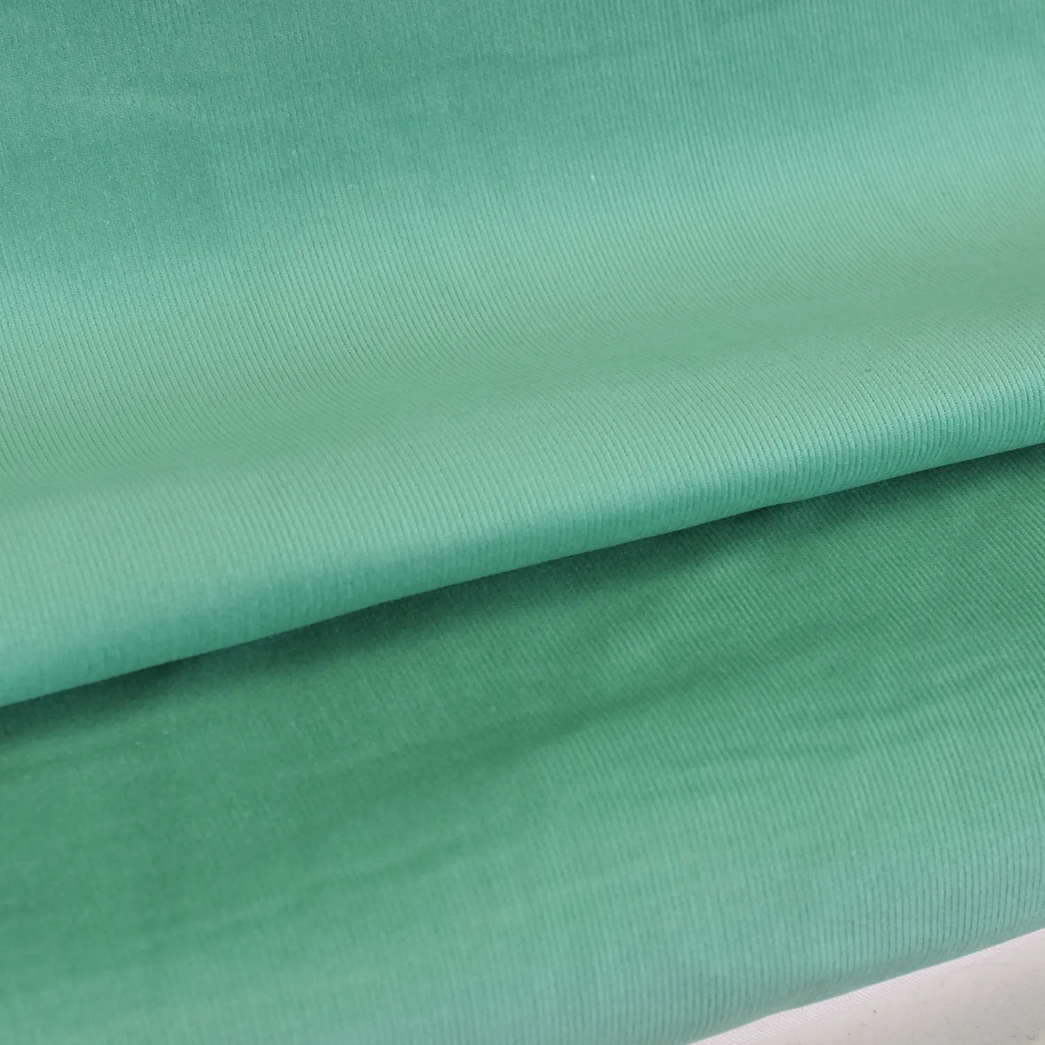 Ribfluweel uni turquoise