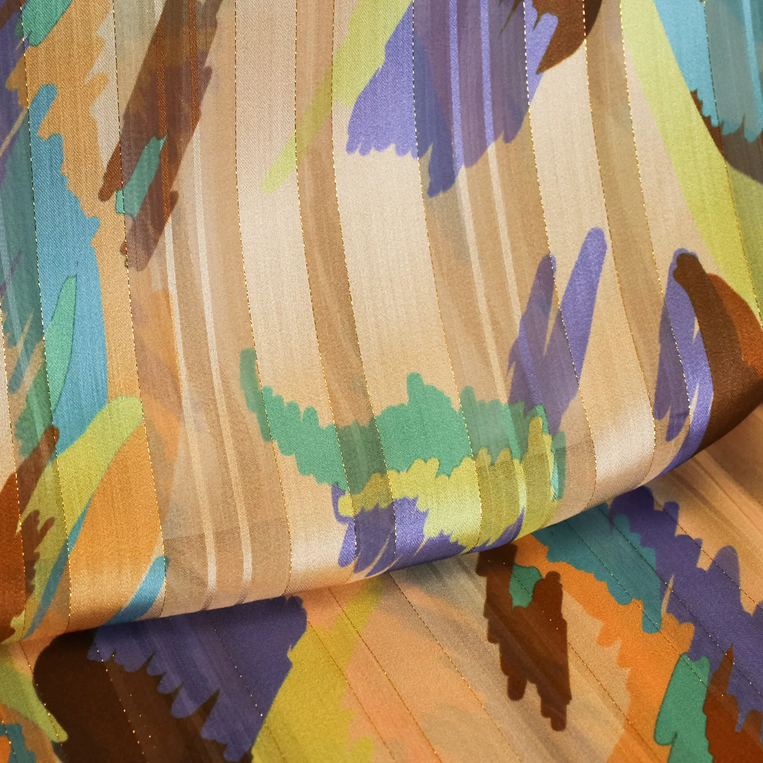 Voile oranje gestreept met gouden lurex - Knipmode