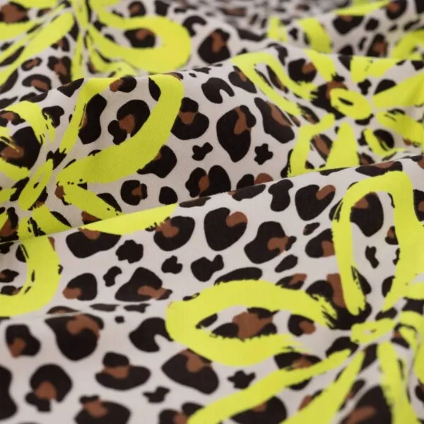 French terry luipaardprint met neon bloemen - Qjutie and the Qjutest - Qjutie & the Qjutest