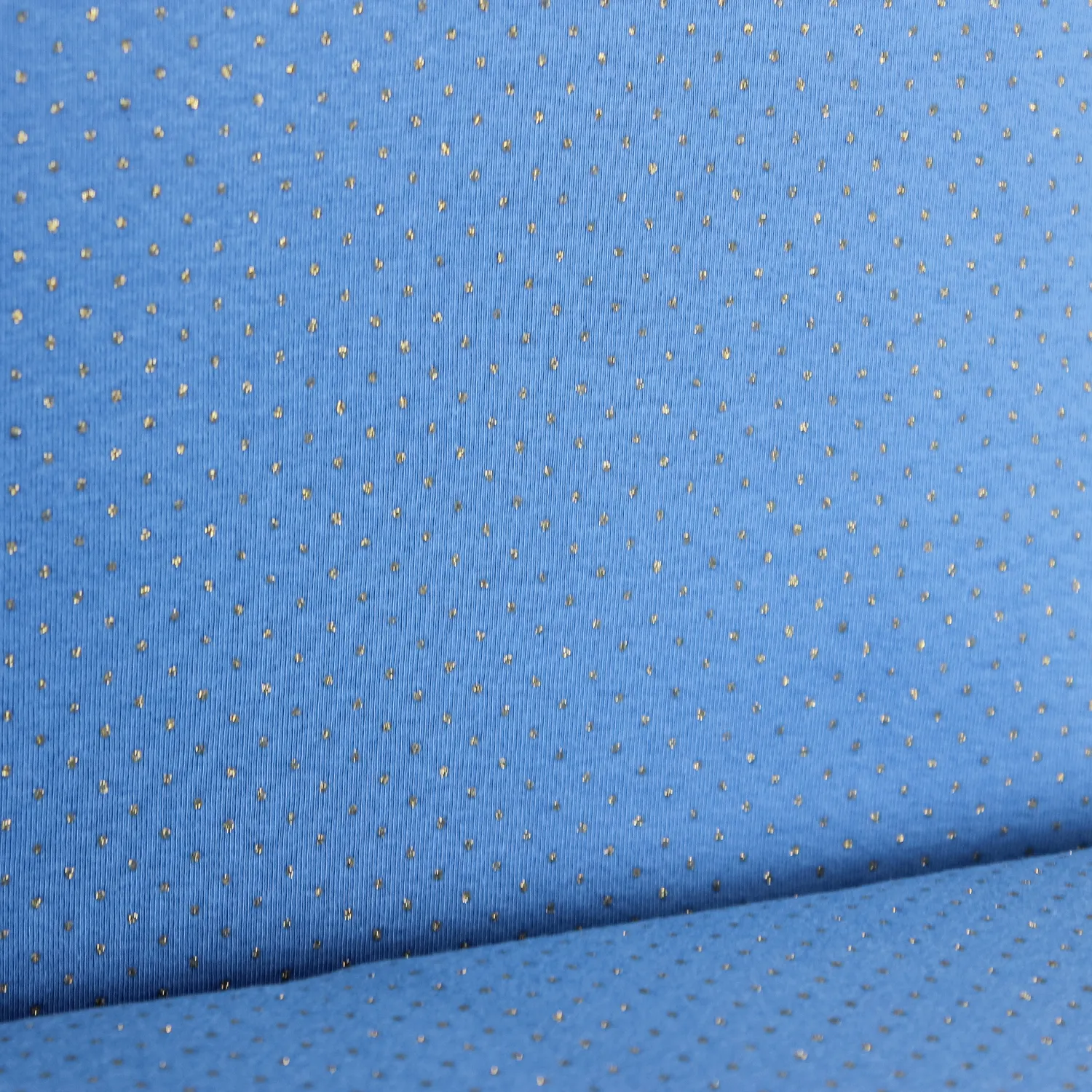 Tricot blauw met gouden lurex bolletjes