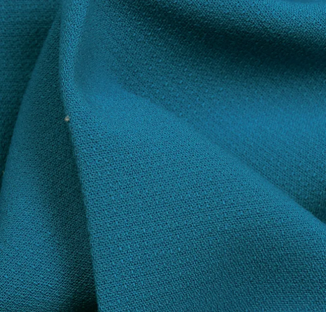 Polyester viscose stretch crêpe effen blauw