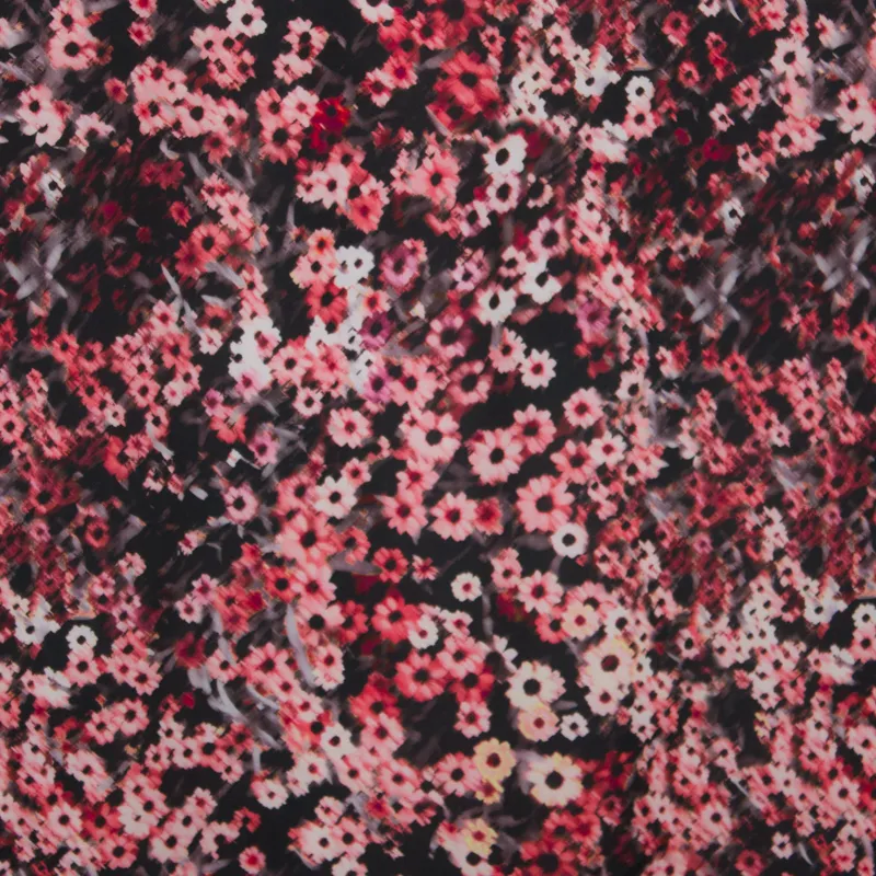 Tricot crêpe zwart met roze bloemmotief