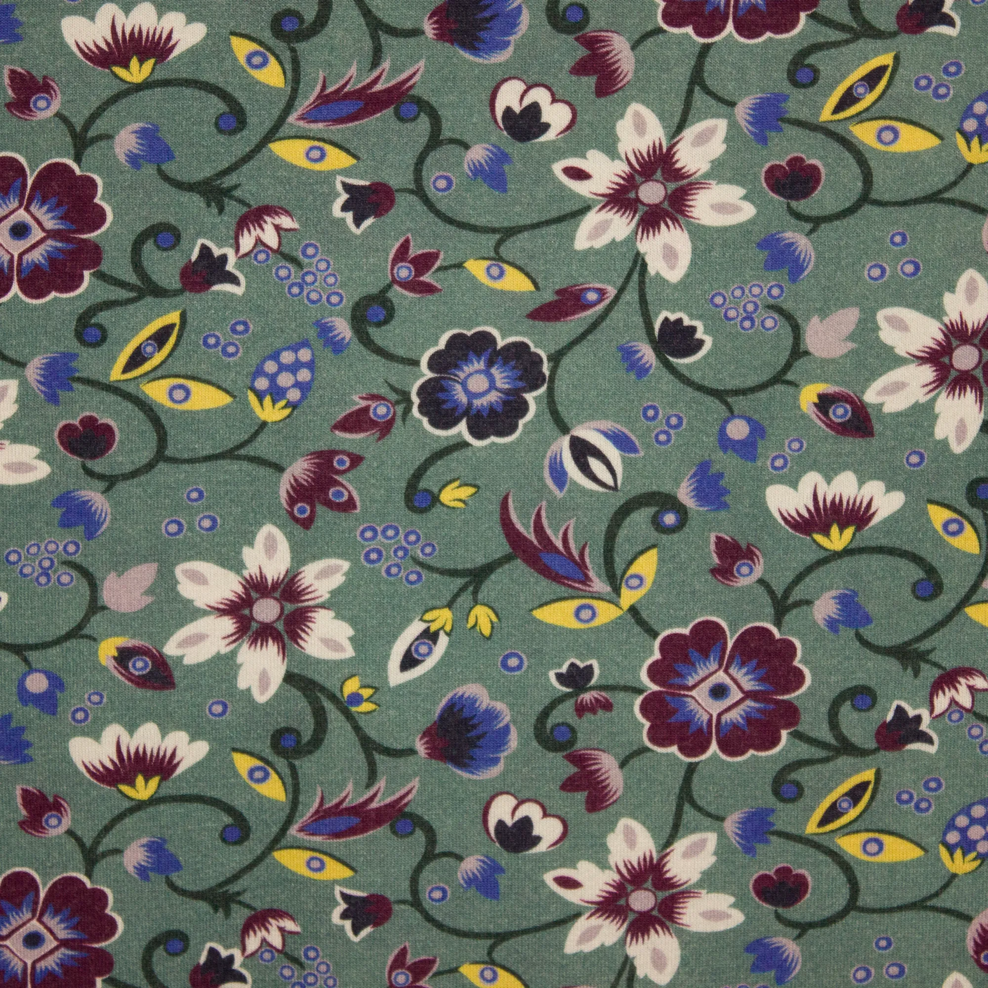 Warme tricot met kleurrijke bloem