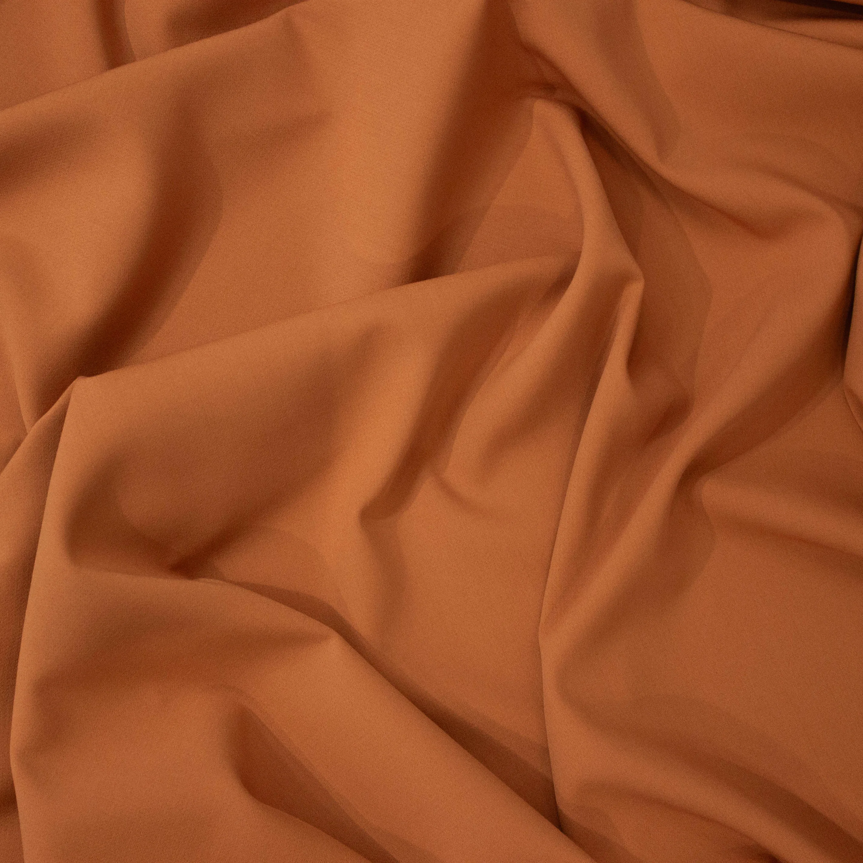 Crêpe stretch warm oranje beige - Lorré