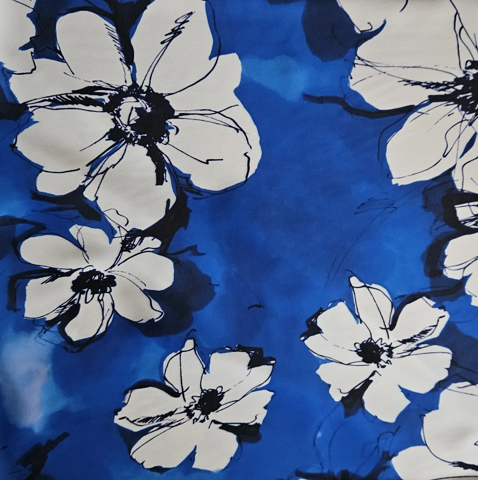 Polyester crêpe blauw met bloemenprint - Lorré