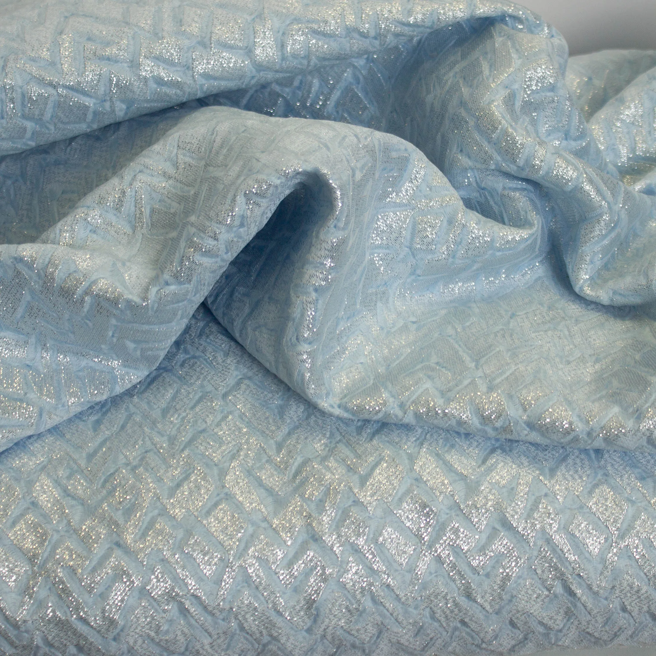 Jacqard lichtblauw met geometrische glitterprint - Lorré