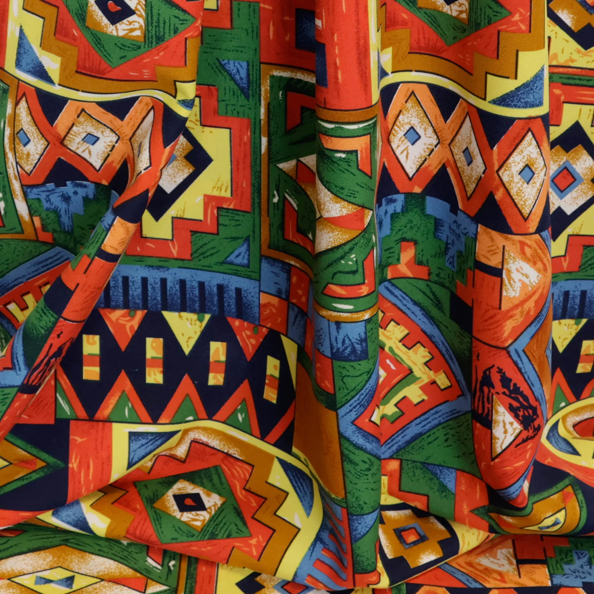 Polyester multicolor met grafische vlakken