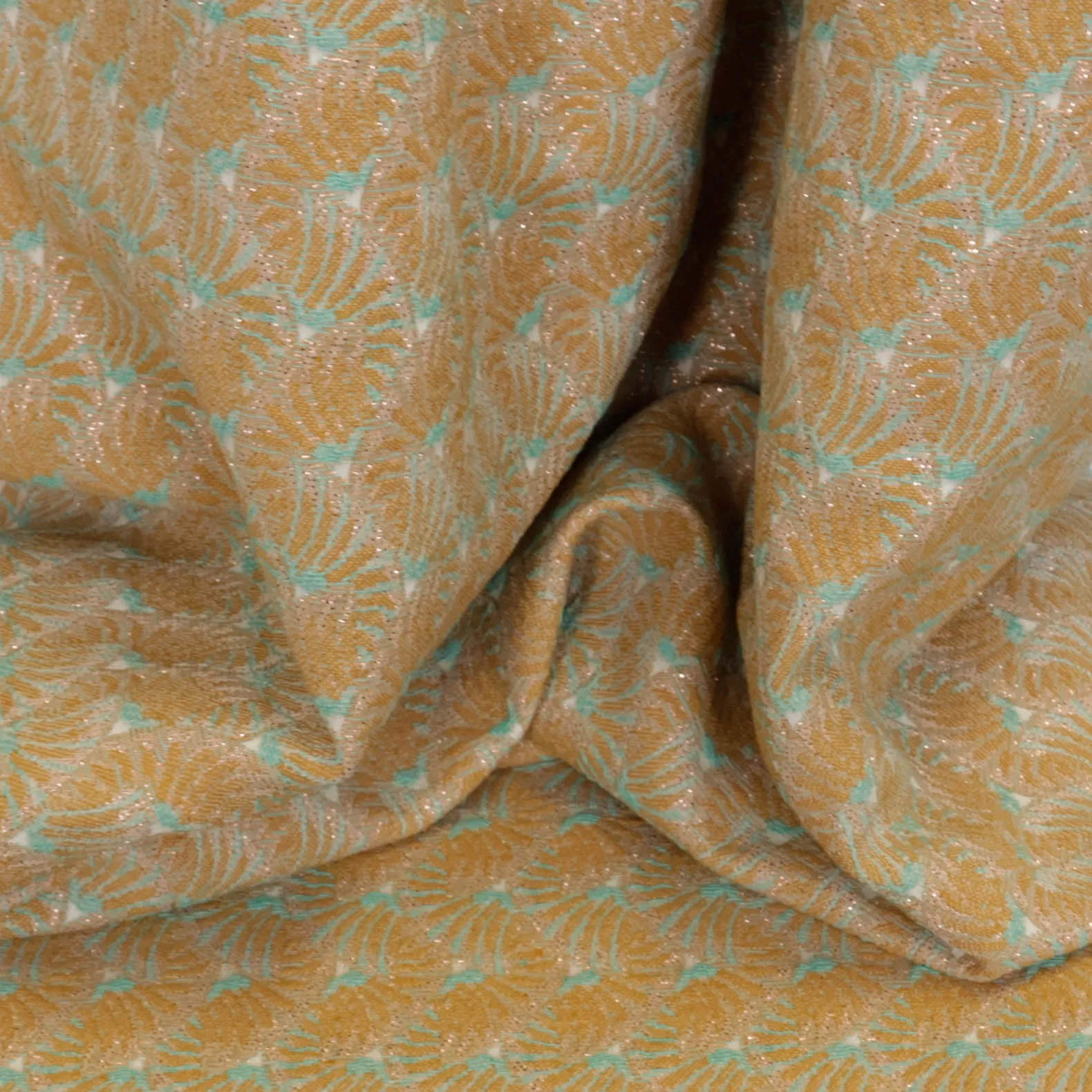 Chanelstof goud met turquoise accenten