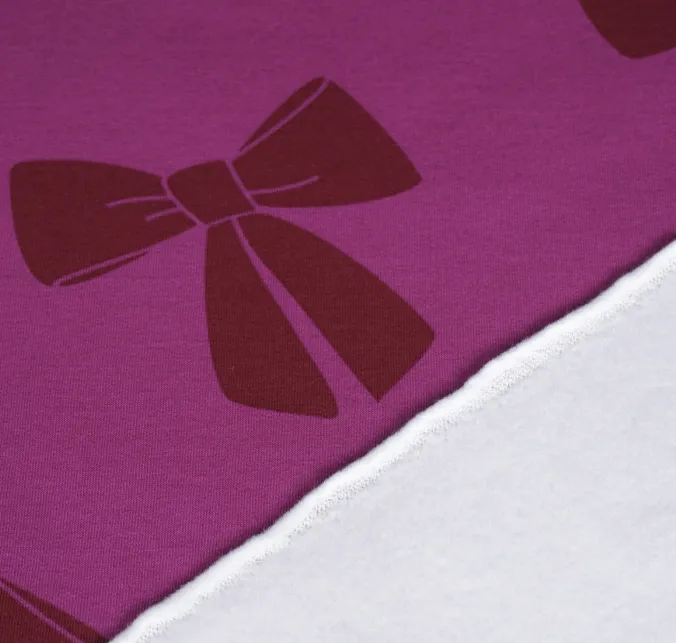 Sweaterstof cyclaam paars met strikken - Qjutie & the Qjutest