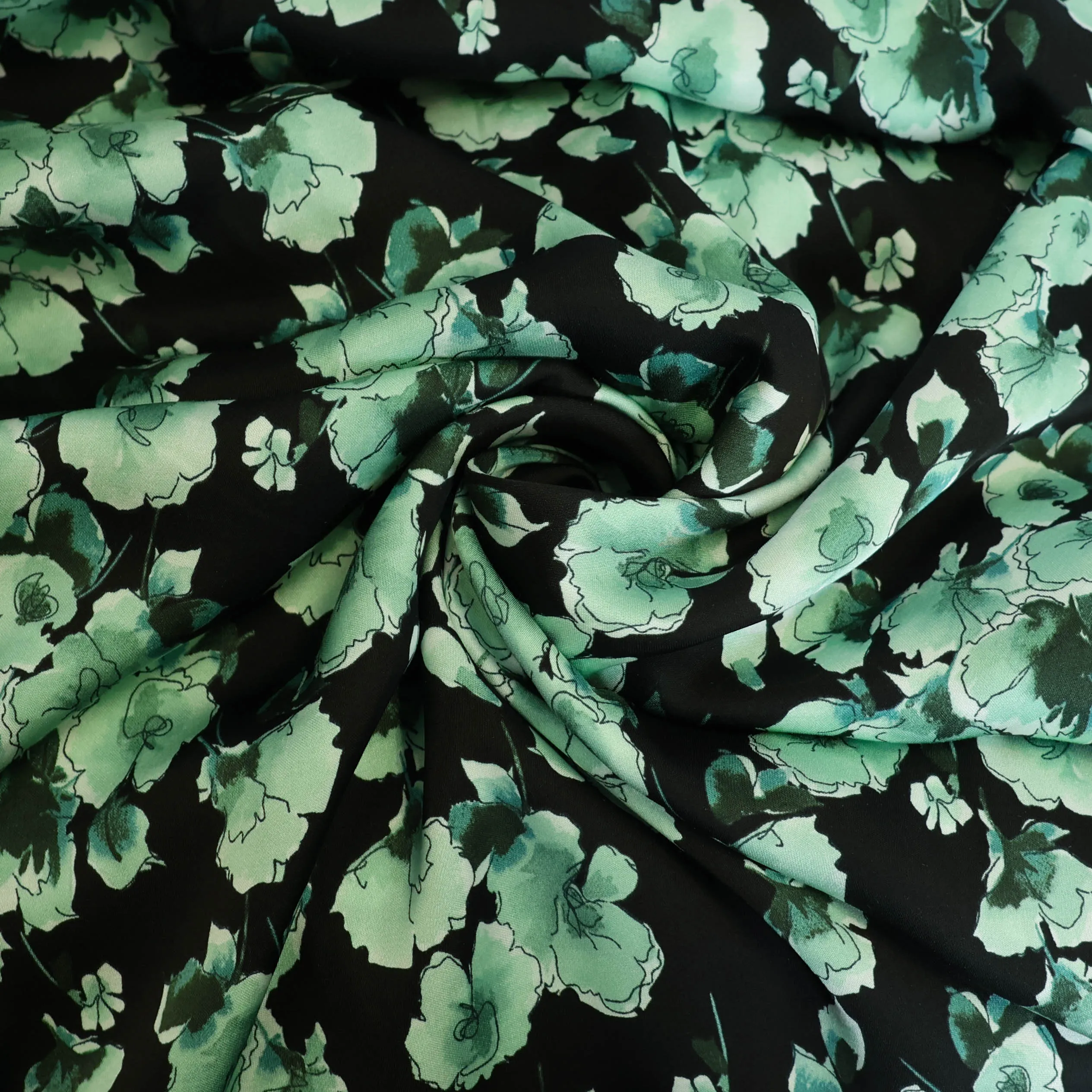 Viscose zwart met muntblauwe bloemen