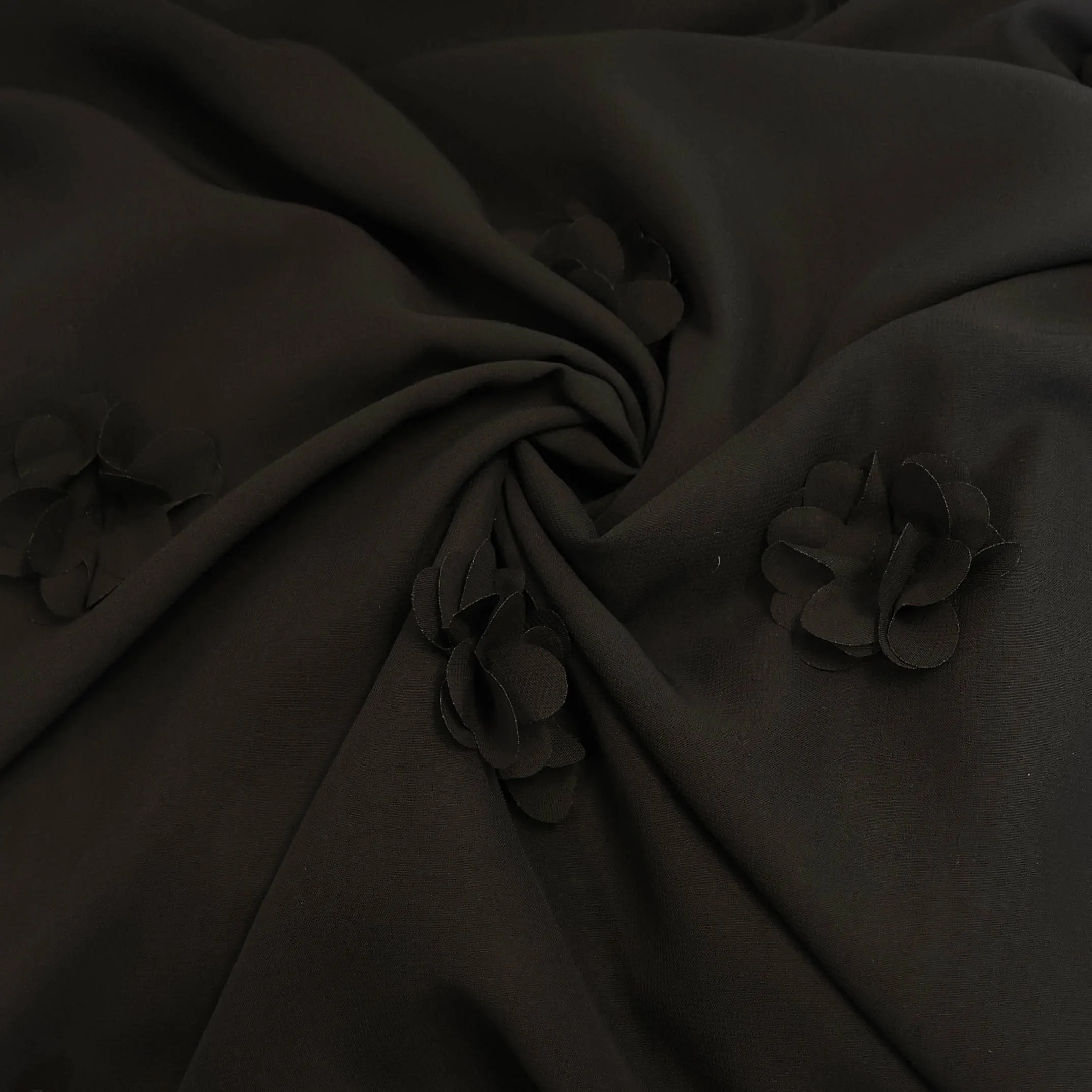 Voile zwart met bloemen