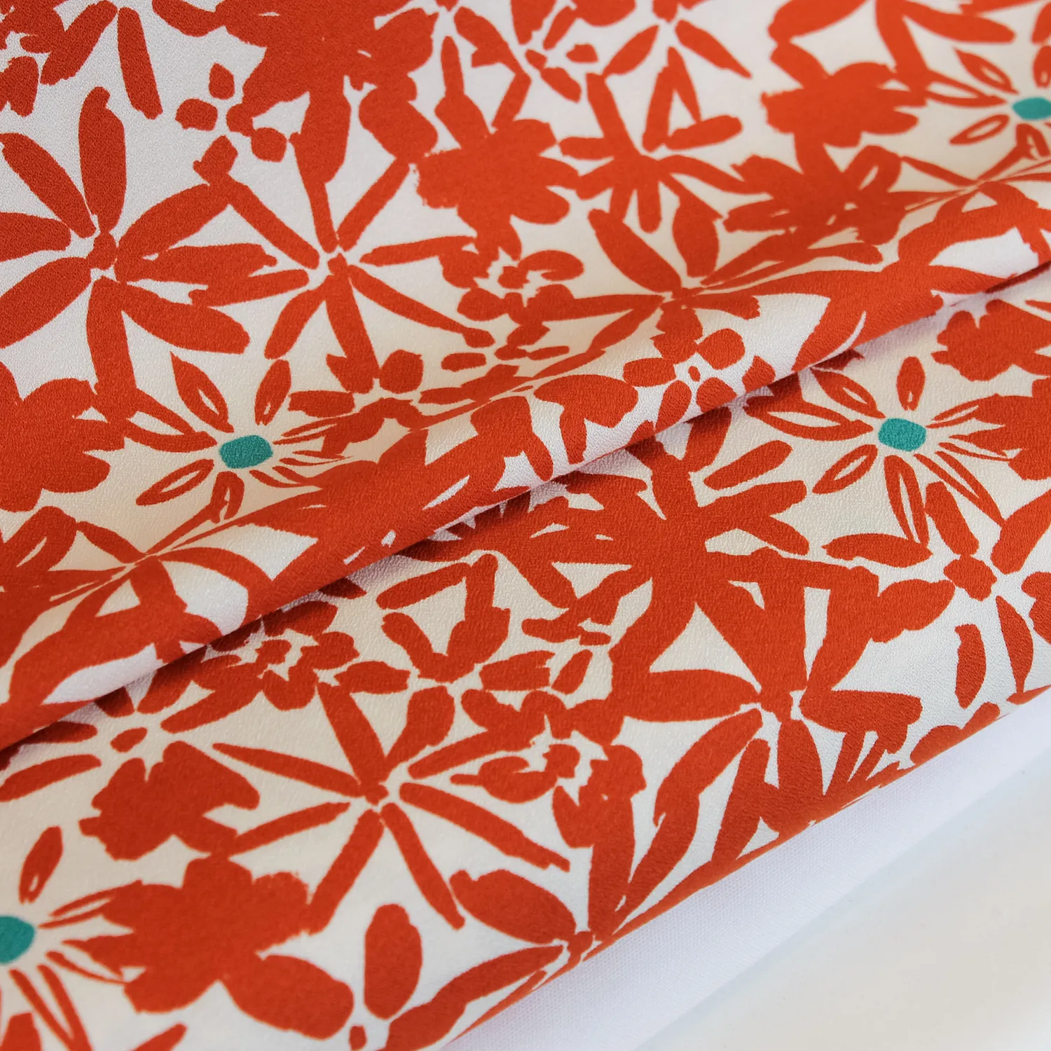 Viscose crêpe wit met oranje 'Pumpkin' bloemen 'Flowery' - Mind The Maker