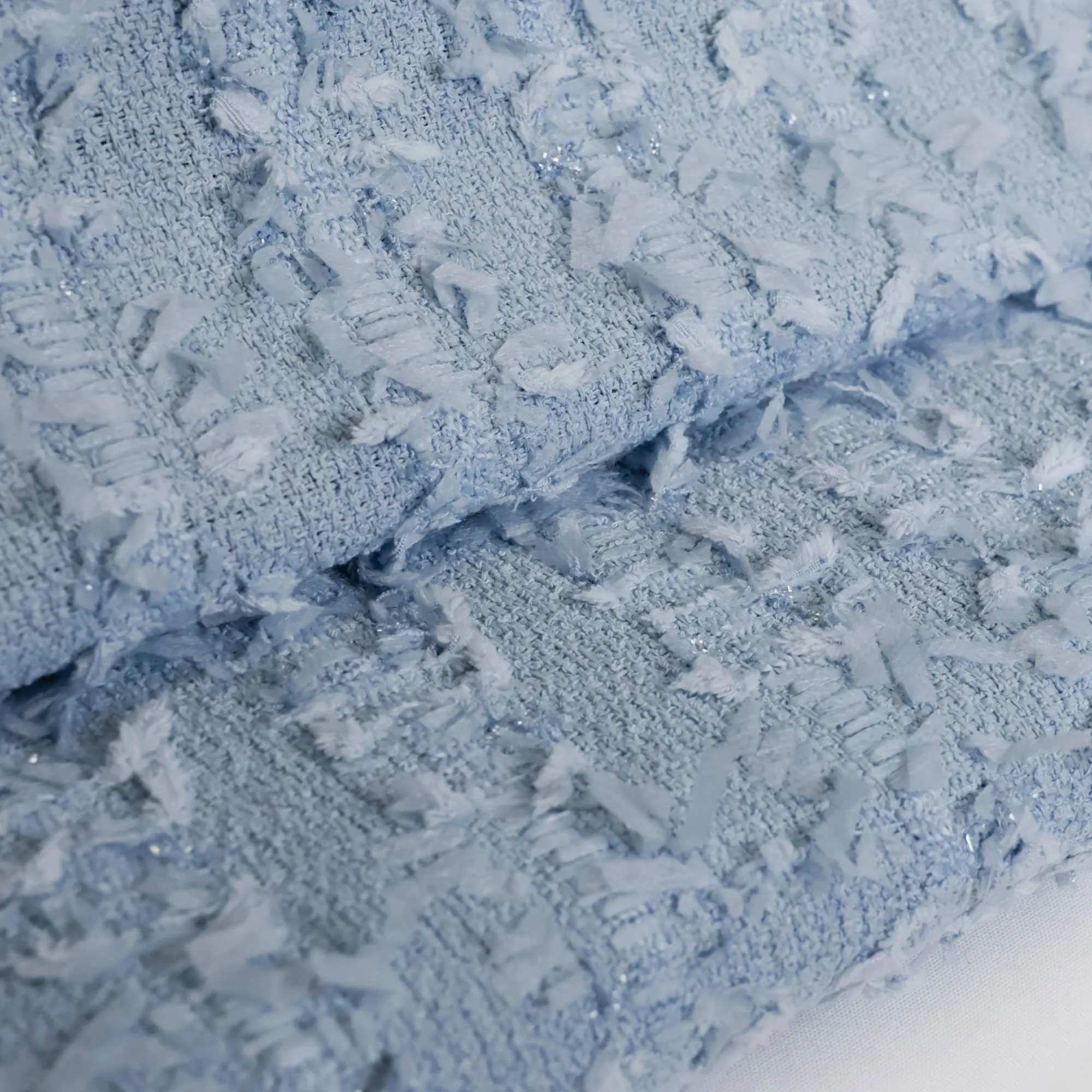 Chanelstof tweed blauw