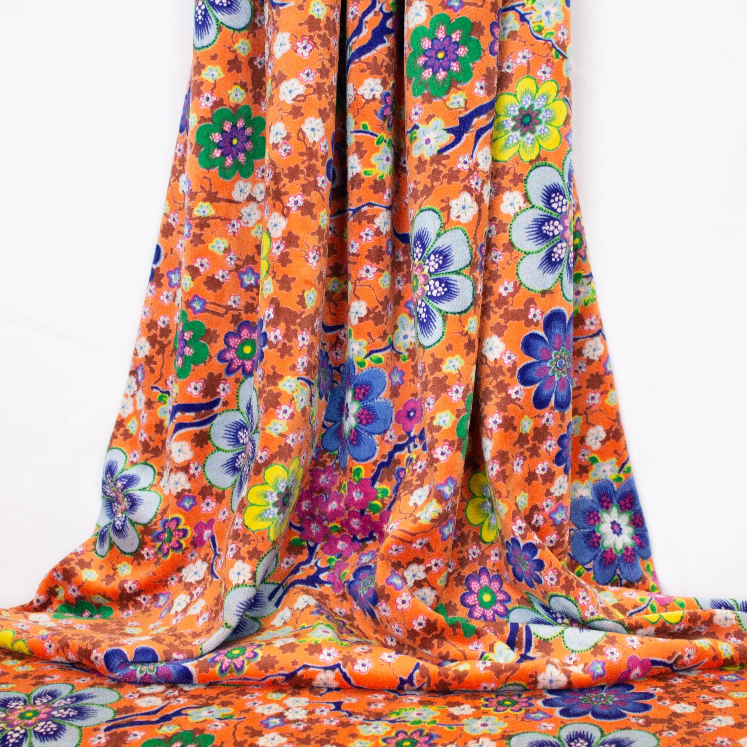 Oranje nicky velours met bloemen