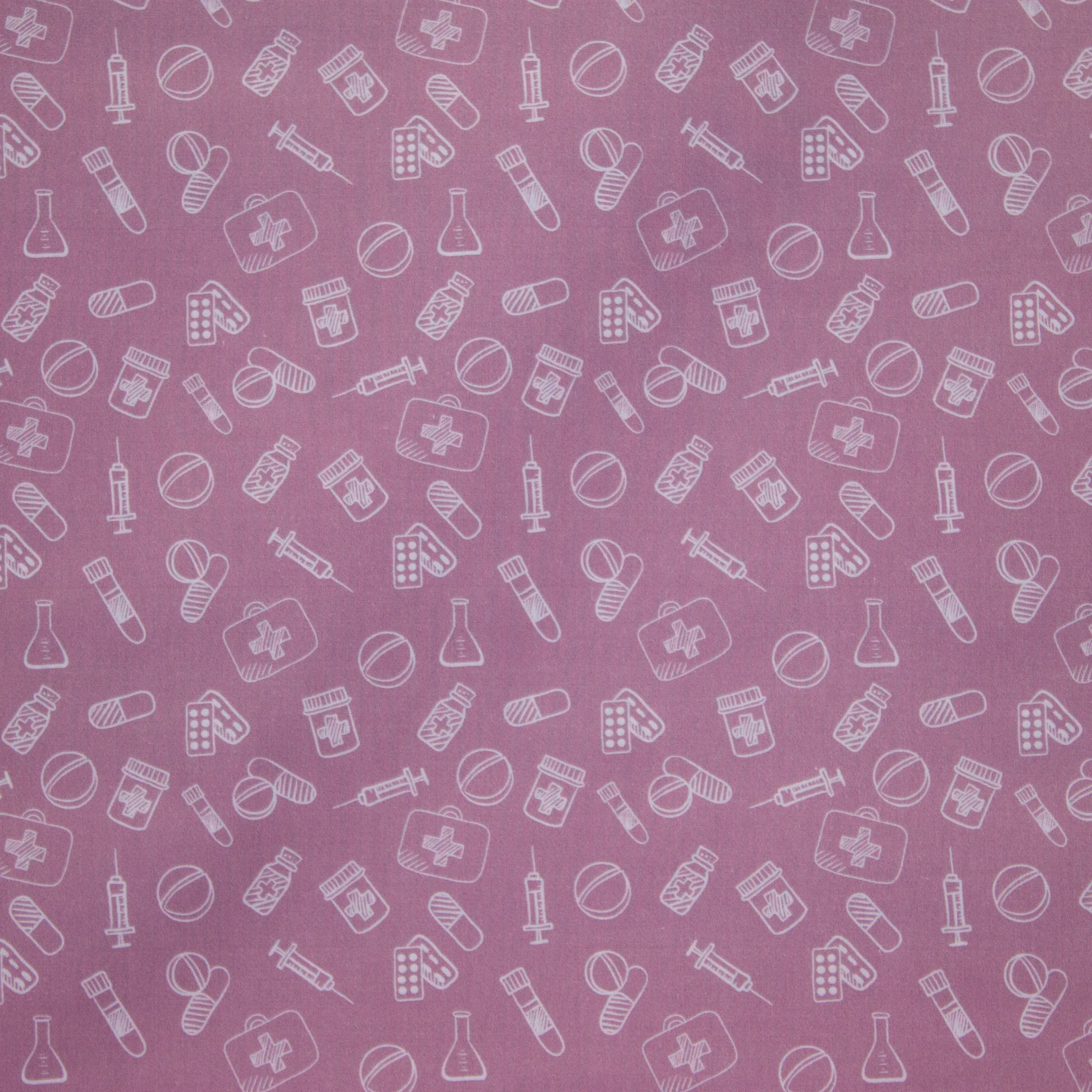Roze katoen met medisch materiaal