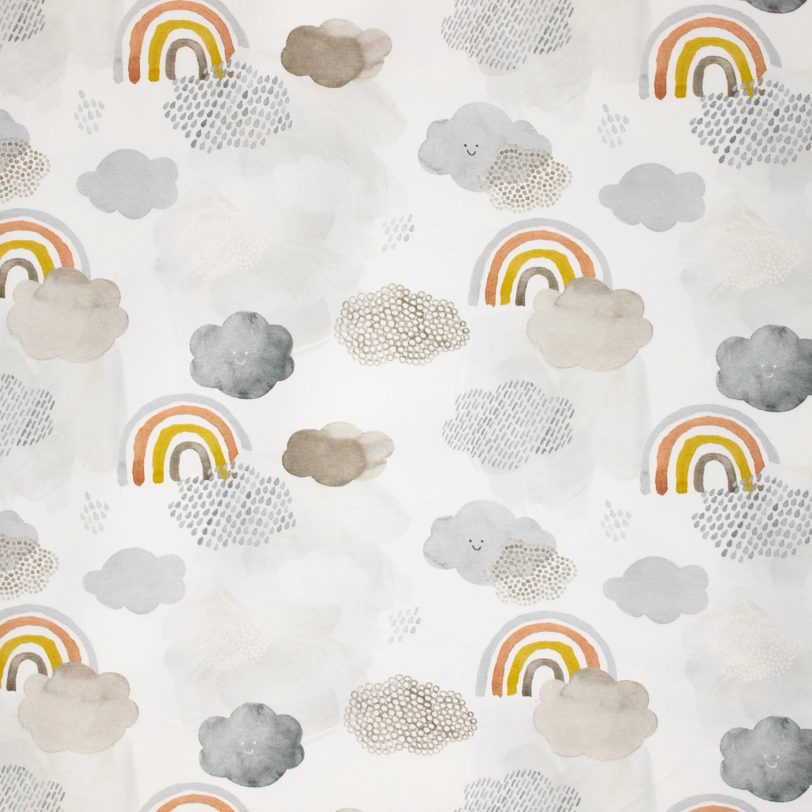 Witte tricot met wolkjes en regenbogen