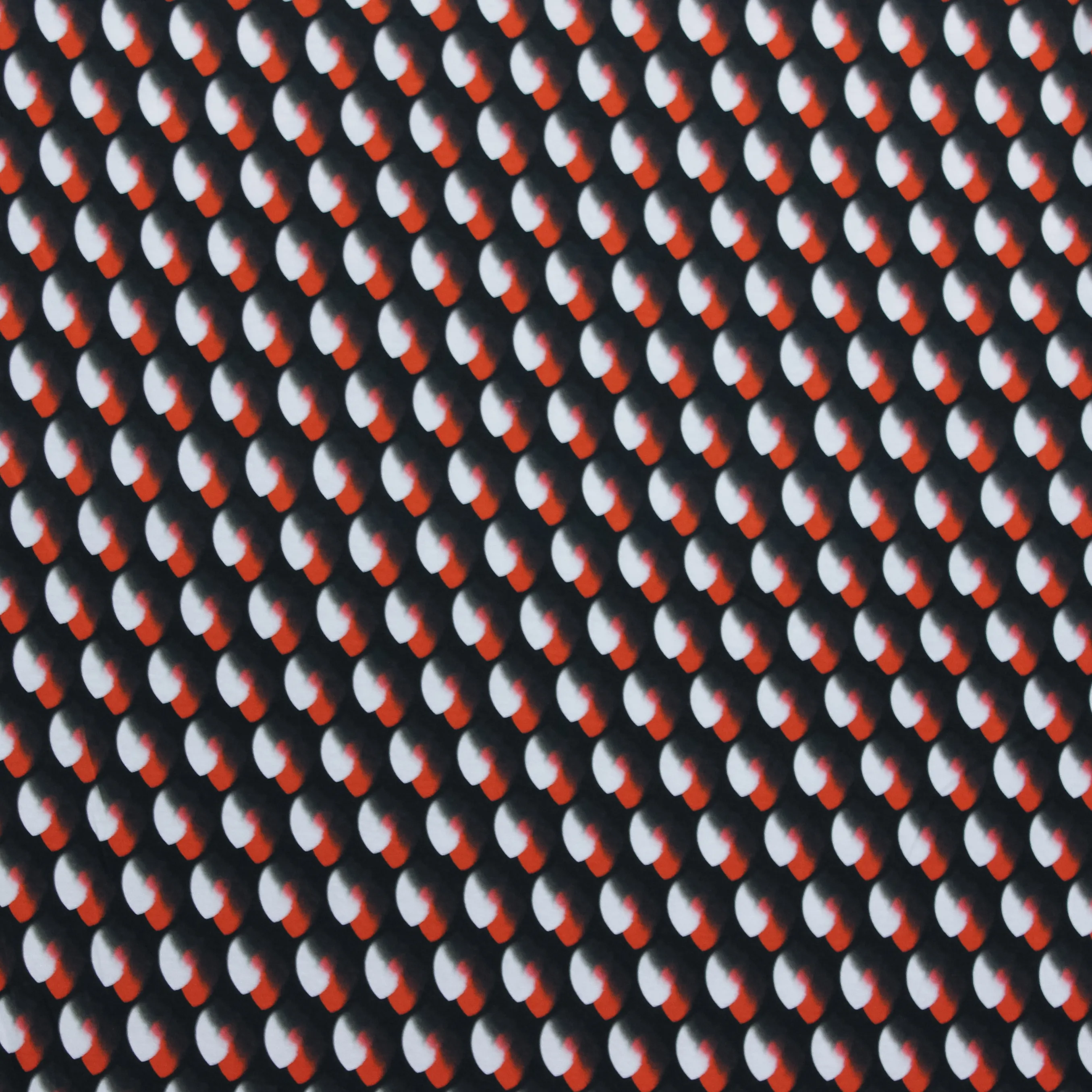 Zwarte Italiaanse viscose tricot met rood en wit motief
