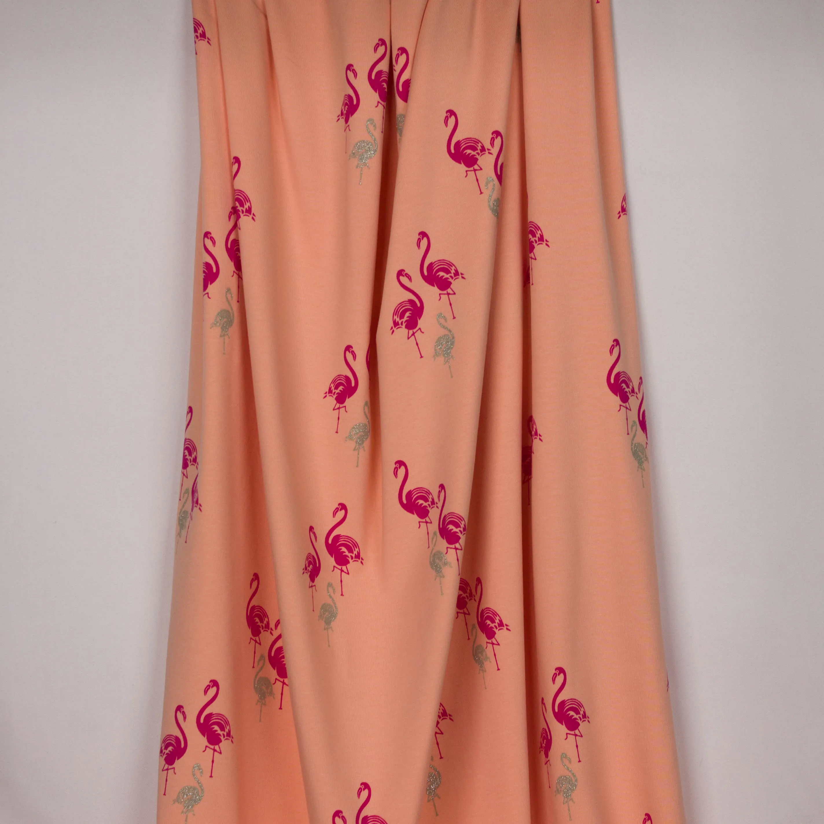 Zalmroze katoentricot met flamingo's - Polly Fabrics