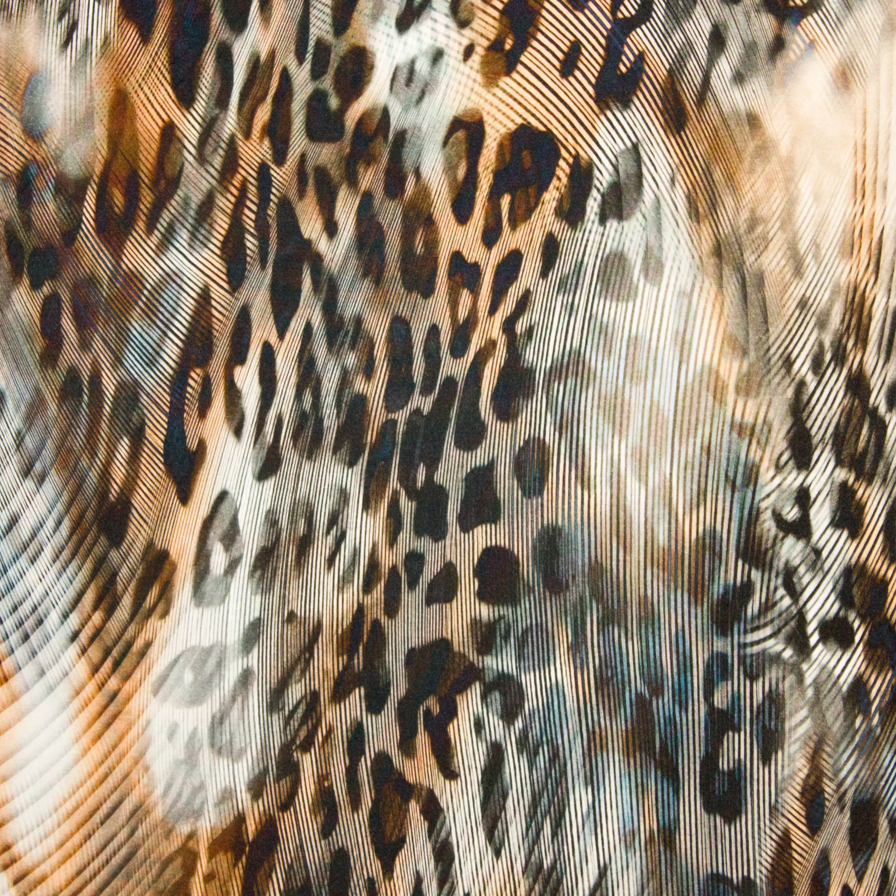 Bruine viscosetricot met luipaardprint
